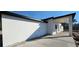 Home exterior featuring a covered patio with white columns and a view of the surrounding landscape at 39817 Forest Dr, Eustis, FL 32736