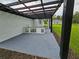 Outdoor covered patio featuring an outdoor kitchen with a sink and counter space at 42157 Tamarac St, Eustis, FL 32736