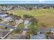 Home situated on a spacious lot within a residential community at 5004 Saint Andrews Arc, Leesburg, FL 34748