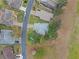 Bird's eye view of single Gathering home on a residential lot at 5004 Saint Andrews Arc, Leesburg, FL 34748