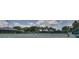 Well-maintained tennis courts with surrounding fencing at 5004 Saint Andrews Arc, Leesburg, FL 34748