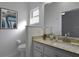 Bathroom features granite countertop, single sink, and toilet at 5622 King James Ave, Leesburg, FL 34748
