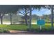 Quaint gazebo and pier parking area by the lake in a peaceful community at 5622 King James Ave, Leesburg, FL 34748