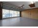 Garage with open door, showing a car and backyard at 5622 King James Ave, Leesburg, FL 34748