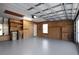 Spacious garage with pegboard and ample storage at 5622 King James Ave, Leesburg, FL 34748
