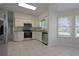 Updated kitchen with stainless steel appliances and granite countertops at 5622 King James Ave, Leesburg, FL 34748