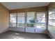 Cozy screened porch overlooking the backyard at 5622 King James Ave, Leesburg, FL 34748