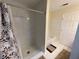 Bathroom with shower stall and patterned shower curtain at 61 Fir Dr, Ocala, FL 34472
