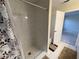 Bathroom with shower stall and patterned shower curtain at 61 Fir Dr, Ocala, FL 34472