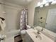 Bathroom with bathtub, toilet and vanity with sink at 61 Fir Dr, Ocala, FL 34472