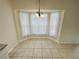 Breakfast nook with bay window and chandelier lighting at 61 Fir Dr, Ocala, FL 34472