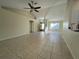 Spacious living room with tile floors and high ceilings at 61 Fir Dr, Ocala, FL 34472