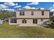 Two-story house with fenced backyard, patio, and screened porch at 632 Monte Vista Way, Winter Garden, FL 34787