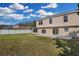 Two-story house with large backyard and a view of a neighboring house at 632 Monte Vista Way, Winter Garden, FL 34787