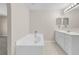 Bathroom features a large garden tub and double vanity at 632 Monte Vista Way, Winter Garden, FL 34787