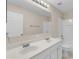 Double vanity bathroom with white cabinets at 632 Monte Vista Way, Winter Garden, FL 34787