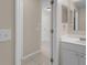 Simple bathroom with white vanity and tiled floor at 632 Monte Vista Way, Winter Garden, FL 34787