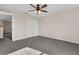 Bright bedroom with ceiling fan and access to a hallway at 632 Monte Vista Way, Winter Garden, FL 34787