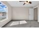 Spacious bedroom with large window and ceiling fan at 632 Monte Vista Way, Winter Garden, FL 34787