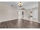 Bright dining room with wood-look floors and chandelier at 632 Monte Vista Way, Winter Garden, FL 34787