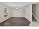 Spacious dining room with wood-look floors and chandelier at 632 Monte Vista Way, Winter Garden, FL 34787
