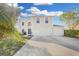 Two-story house with a three-car garage and landscaping at 632 Monte Vista Way, Winter Garden, FL 34787