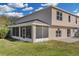 Two-story house with screened porch and backyard at 632 Monte Vista Way, Winter Garden, FL 34787