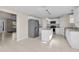 Modern kitchen with white cabinets, stainless steel appliances, and granite countertops at 632 Monte Vista Way, Winter Garden, FL 34787