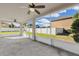 Screened porch with ceiling fans and backyard view at 632 Monte Vista Way, Winter Garden, FL 34787