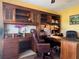 Spacious home office with custom built-in shelving and desk space at 752 Maybank Loop, The Villages, FL 32162