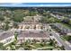 Aerial view of townhouses and surrounding landscape at 765 Walkers Grove Ln, Winter Garden, FL 34787