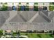 Top-down view of townhouse roofs and private backyards at 765 Walkers Grove Ln, Winter Garden, FL 34787