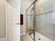 Bathroom with walk-in shower and bench seat at 765 Walkers Grove Ln, Winter Garden, FL 34787