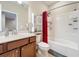 Clean bathroom with shower/tub combo, vanity, and toilet at 765 Walkers Grove Ln, Winter Garden, FL 34787