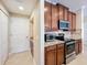 Kitchen with stainless steel appliances and granite countertops at 765 Walkers Grove Ln, Winter Garden, FL 34787