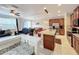 Modern kitchen with granite island and stainless steel appliances at 765 Walkers Grove Ln, Winter Garden, FL 34787