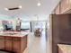 Open concept kitchen with island and stainless steel appliances at 765 Walkers Grove Ln, Winter Garden, FL 34787