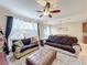 Spacious living room featuring comfortable seating and a cozy atmosphere at 765 Walkers Grove Ln, Winter Garden, FL 34787