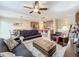 Open living room featuring a comfy seating area and a ceiling fan at 765 Walkers Grove Ln, Winter Garden, FL 34787