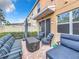 Outdoor patio with seating area and grill at 765 Walkers Grove Ln, Winter Garden, FL 34787