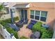 Aerial view of a private patio with seating area and grill at 765 Walkers Grove Ln, Winter Garden, FL 34787