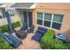 Brick patio with seating area, grill, and privacy fence at 765 Walkers Grove Ln, Winter Garden, FL 34787