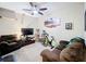 Relaxing Recreation room with TV, exercise bike and seating at 765 Walkers Grove Ln, Winter Garden, FL 34787