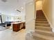 Modern staircase leading to the upper level at 765 Walkers Grove Ln, Winter Garden, FL 34787