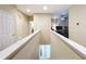 Upstairs hallway with access to bedrooms at 765 Walkers Grove Ln, Winter Garden, FL 34787