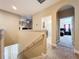 Upstairs hallway with access to bedrooms and bath at 765 Walkers Grove Ln, Winter Garden, FL 34787