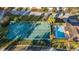 Community features a tennis court and swimming pool at 8801 Village Green Blvd, Clermont, FL 34711