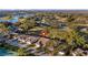 Community overview showing home location, golf course, and lake at 8801 Village Green Blvd, Clermont, FL 34711