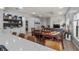 Kitchen and dining area with hardwood floors and a wood table at 8801 Village Green Blvd, Clermont, FL 34711