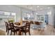 Modern kitchen with an island, stainless steel appliances, and a breakfast nook at 8801 Village Green Blvd, Clermont, FL 34711